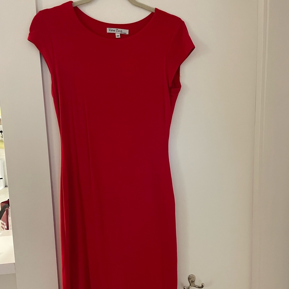 Below the knee length, red dress